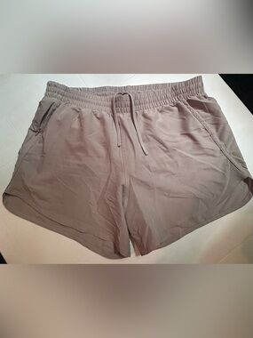 Under Armour Women’s Athletic Shorts in Tan